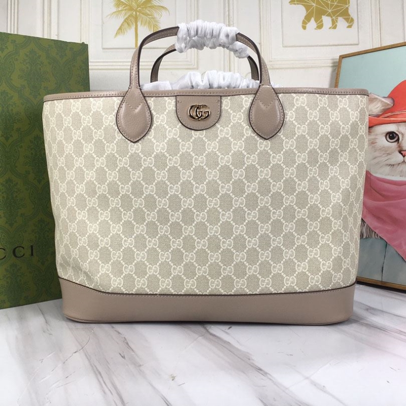 G*u*i shopping bags